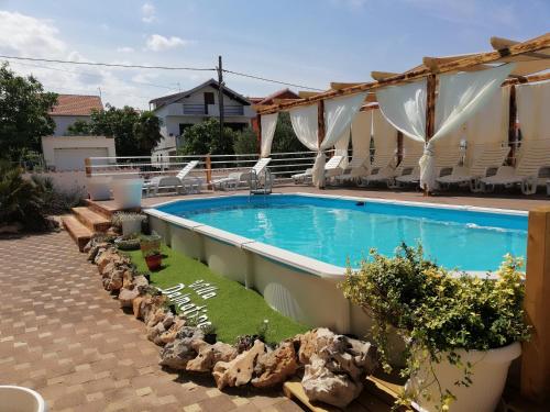 Piscina a Apartments Villa Dalmatina o a prop