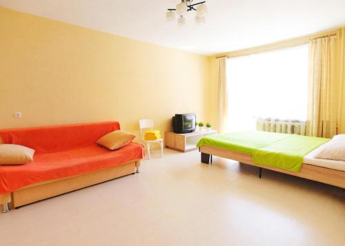 Krevet ili kreveti u jedinici u okviru objekta Poltava Green Apartments