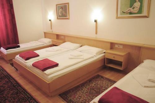 A bed or beds in a room at Albergo Casagrande