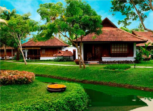 גינה חיצונית ב-Kumarakom Lake Resort