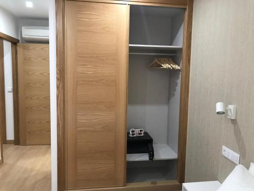 Apartamentos Areas房間的床