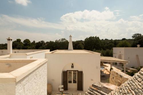 En balkon eller terrasse på Masseria Fenicia