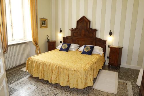 Vuode tai vuoteita majoituspaikassa B&B Villa Dei Pini