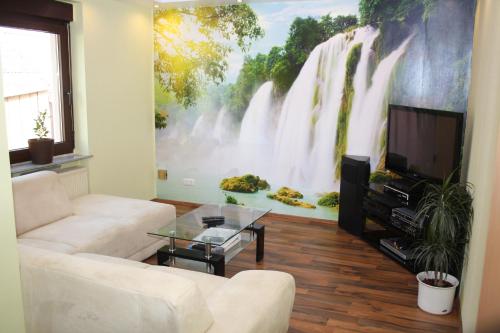 Area tempat duduk di Ferienwohnung Golden Lotus