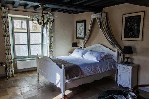 Ліжко або ліжка в номері Manoir Sainte Victoire