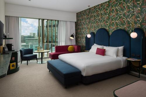 Cama ou camas em um quarto em Ovolo The Valley Brisbane