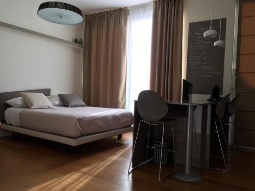 Кровать или кровати в номере Corso Como New Building Apartment