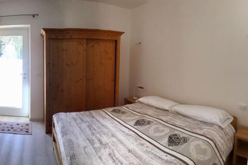 Cama ou camas em um quarto em Agriturismo Moiè