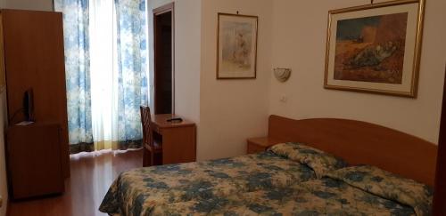 Krevet ili kreveti u jedinici u okviru objekta Hotel Tirreno