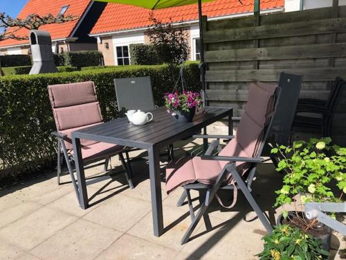 En terrasse eller udendørsområde på De Eerste Stuiver