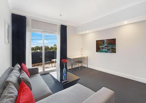 Khu vực ghế ngồi tại Sydney Airport Suites