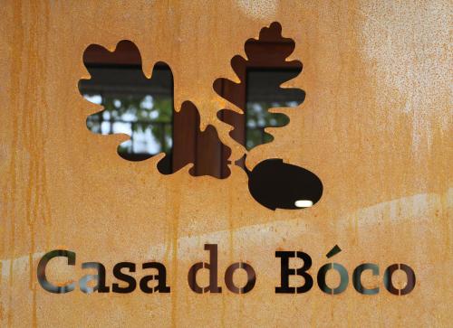 een bord voor de csa do lobo op een gebouw bij Casa do Boco in Oliveira do Hospital