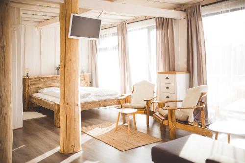 Gazdovský dvor B&B s Mini Wellness 객실 침대