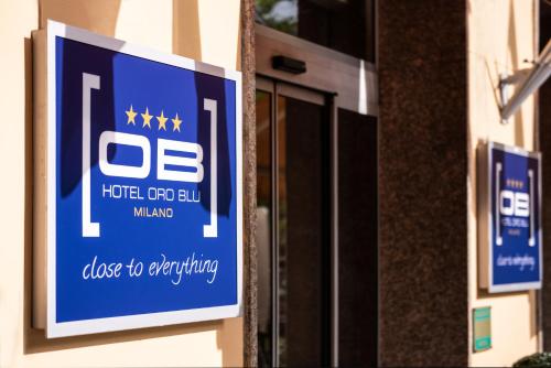 Un certificado, premio, cartel u otro documento en Hotel Oro Blu