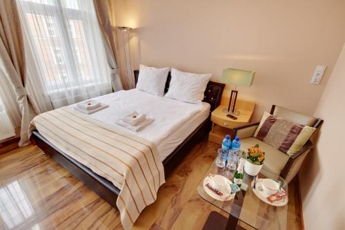 Voodi või voodid majutusasutuse Jagiellonska 3 ApartHotel - Deluxe Rooms with King Beds, City Center, Free Wifi! toas