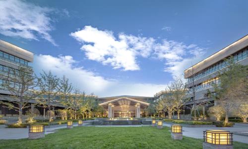 a rendering of a building with a courtyard at Gran Melia Xi'an in Xi'an