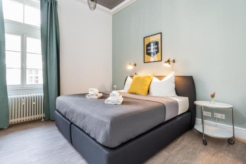 Ліжко або ліжка в номері Freiburg Appartements am Augustinerplatz