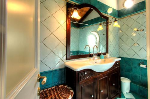 A bathroom at The Red Bougainvillea Apartments