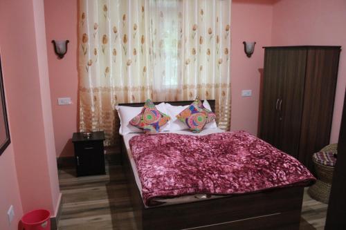 Giường trong phòng chung tại Kitsel Homestay