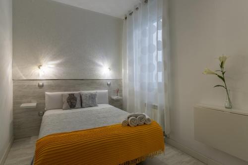 Katil atau katil-katil dalam bilik di Hostal Met Madrid