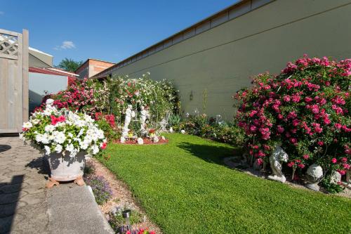 Sodas prie apgyvendinimo įstaigos Auszeit Leoben 3 mit Gartenterasse und Gratisparkplatz