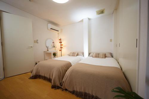 SHINJUKU 5-ROOM Family house में एक कमरे में एक या कई बेड