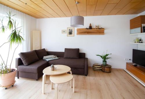 Area tempat duduk di Schöne und helle Ferienwohnung in Pfaffenweiler