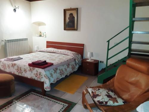 Postel nebo postele na pokoji v ubytování B&B Il Nespolo