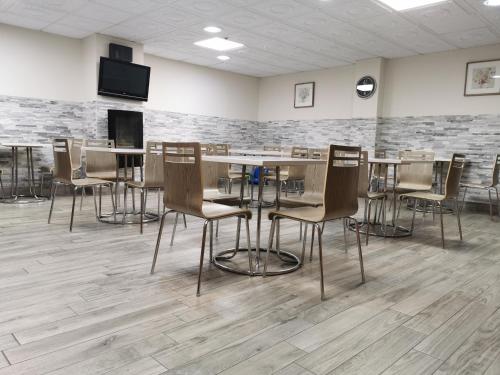 Restoran ili neka druga zalogajnica u objektu Auberge de la Gare