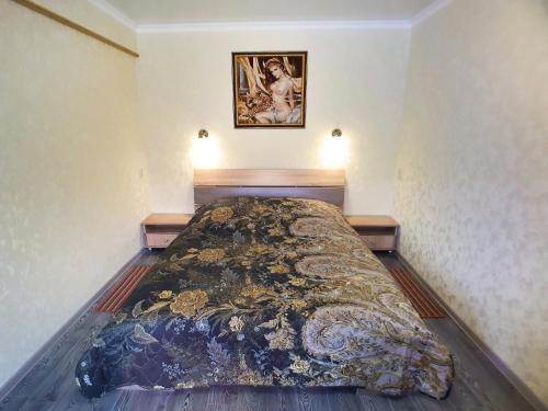 Tempat tidur dalam kamar di Lux Apartment on Mayakovsky 6