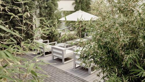 Un jardín fuera de The Pure, Frankfurt, a Member of Design Hotels