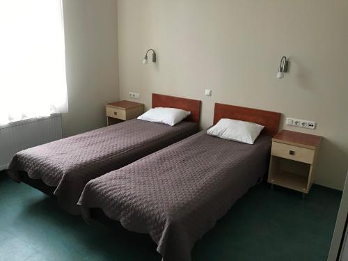 Krevet ili kreveti u jedinici u objektu Hommiku Guesthouse