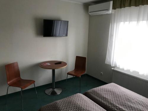 TV i/ili zabavni centar u objektu Hommiku Guesthouse