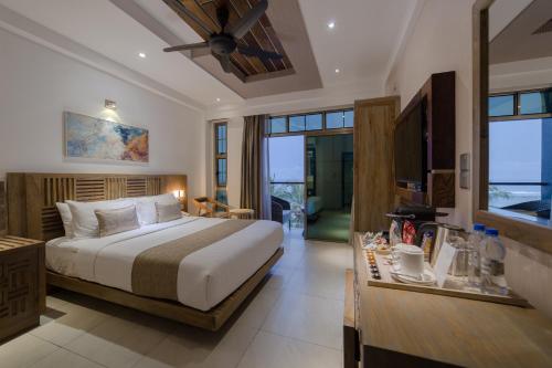 Tempat tidur dalam kamar di Hotel Ocean Grand at Hulhumale