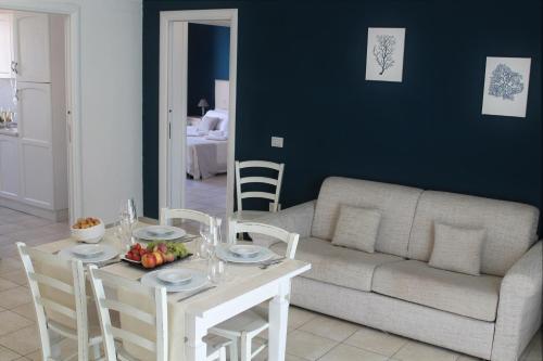 A seating area at AHR Leonis Residence La Maddalena