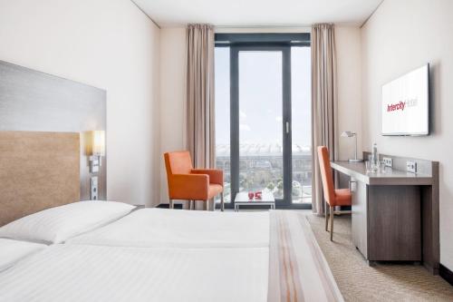 Voodi või voodid majutusasutuse IntercityHotel Dresden toas