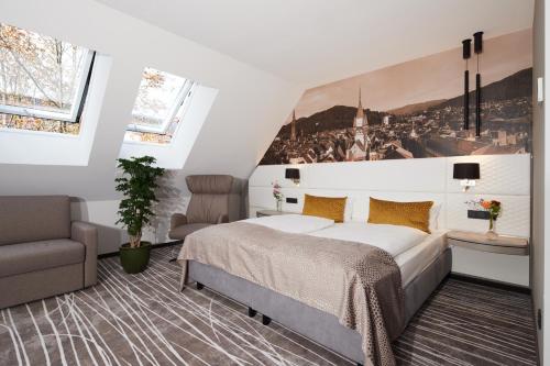 Cama ou camas em um quarto em Boutiquehotel am Stadtgarten