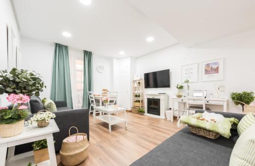 TV i/ili multimedijalni sistem u objektu Apartment Sol Gran Vía