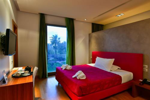 เตียงในห้องที่ Arthotel & Park Lecce