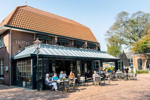 Restoran või mõni muu söögikoht majutusasutuses Hotel Restaurant de Jong