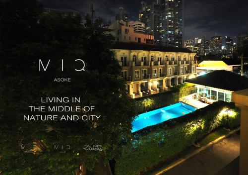 a quote about living in the middle of nature and city at MIQ Asoke808 Villa - Asoke BTS - garden pool - 16 Pax in Bangkok