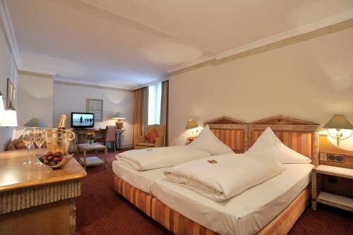 Cama ou camas em um quarto em Olymp Munich