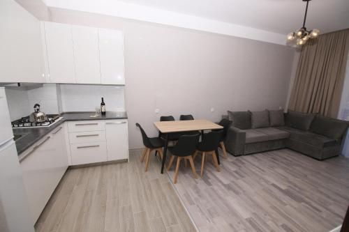 Кухня или мини-кухня в Apartment Didveli 7
