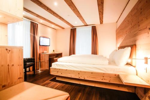 Cama ou camas em um quarto em Gasthaus zur Waldegg; BW Signature Collection