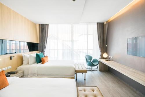 Tempat tidur dalam kamar di Hotel Vista