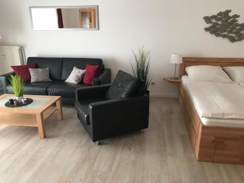 Svetainės erdvė apgyvendinimo įstaigoje Steiner Strandappartements Appartement 307 Süd- Landseite