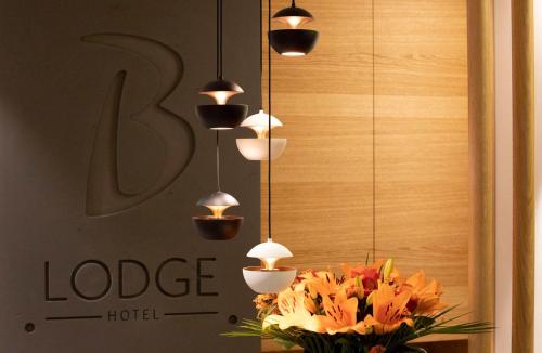 Сертификат, награда, вывеска или другой документ, выставленный в B-Lodge Boutique Hôtel