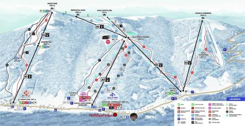 um mapa de uma estância de esqui nas montanhas em Hołdysówka przy Gondoli em Szczyrk