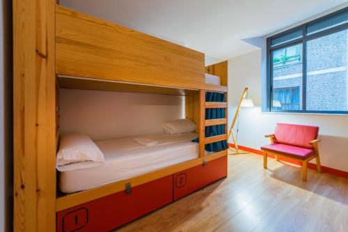 Кровать или кровати в номере Ok Hostel Madrid