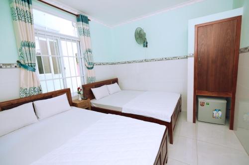 A bed or beds in a room at Sevensea Vung Tau